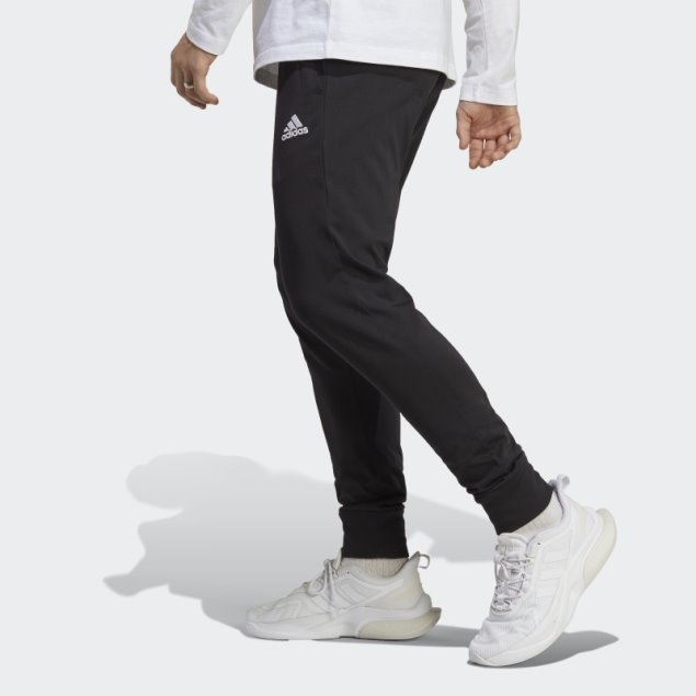Pantalones Adidas Essentials De Punto Liso Con Puños Cónicos En Negro