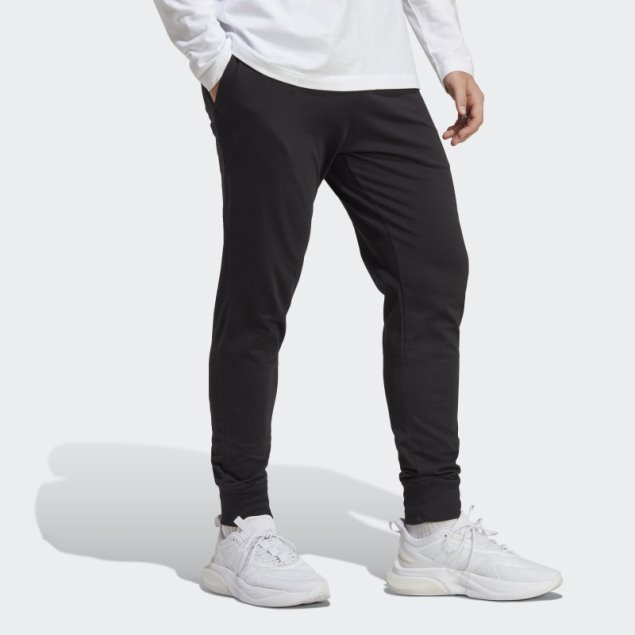 Pantalones Adidas Essentials De Punto Liso Con Puños Cónicos En Negro