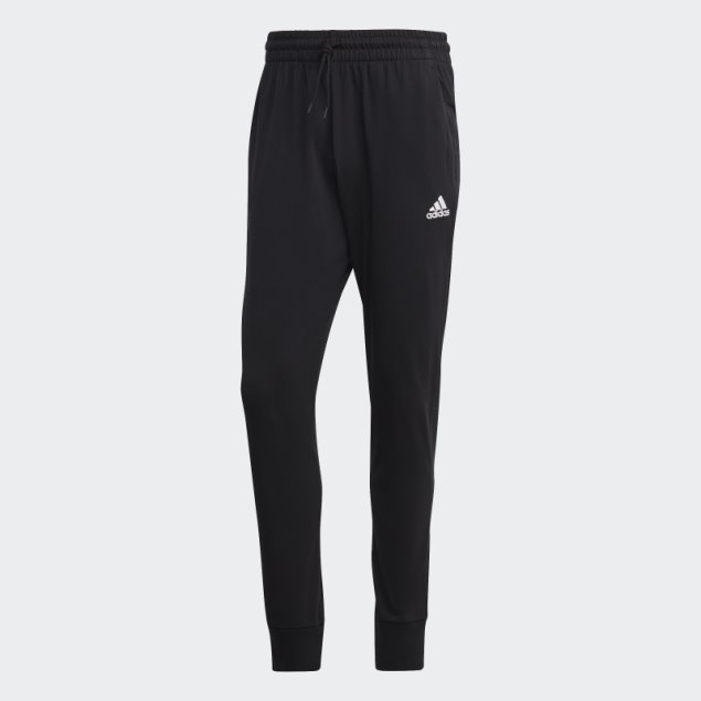 Pantalones Adidas Essentials De Punto Liso Con Puños Cónicos En Negro