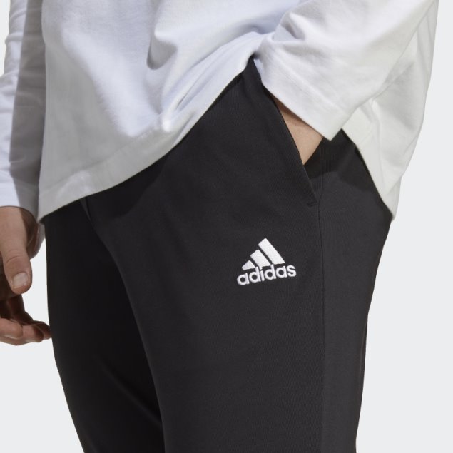 Pantalones Adidas Essentials De Punto Liso Con Puños Cónicos En Negro