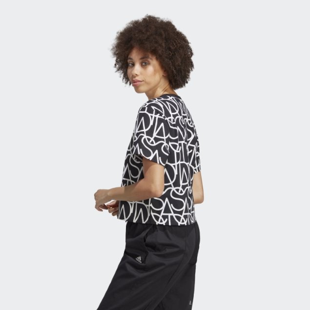 Camiseta Negra Con Gráfico De Adidas En Toda La Prenda Caliente