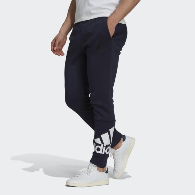 Pantalones De Forro Polar Con Logo En Los Puños Cónicos De Essentials Tinta Adidas