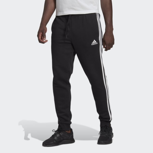 Pantalón Adidas Essentials De 3 Bandas Con Puños Ajustados Y Forro Polar Negro